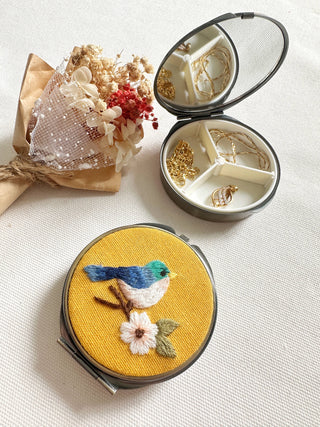 Floral Embroidered Round Jewelry Box With Mirror
Success: 4. Bird